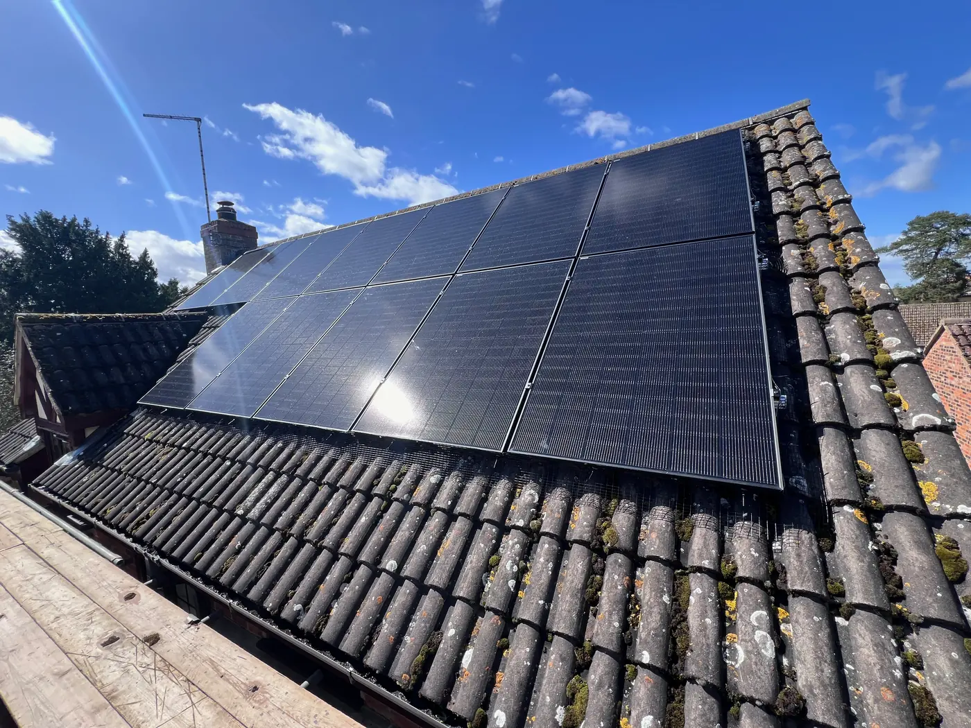All black solar panels on a tiled roof in Kimbolton, fitted by Selec Group