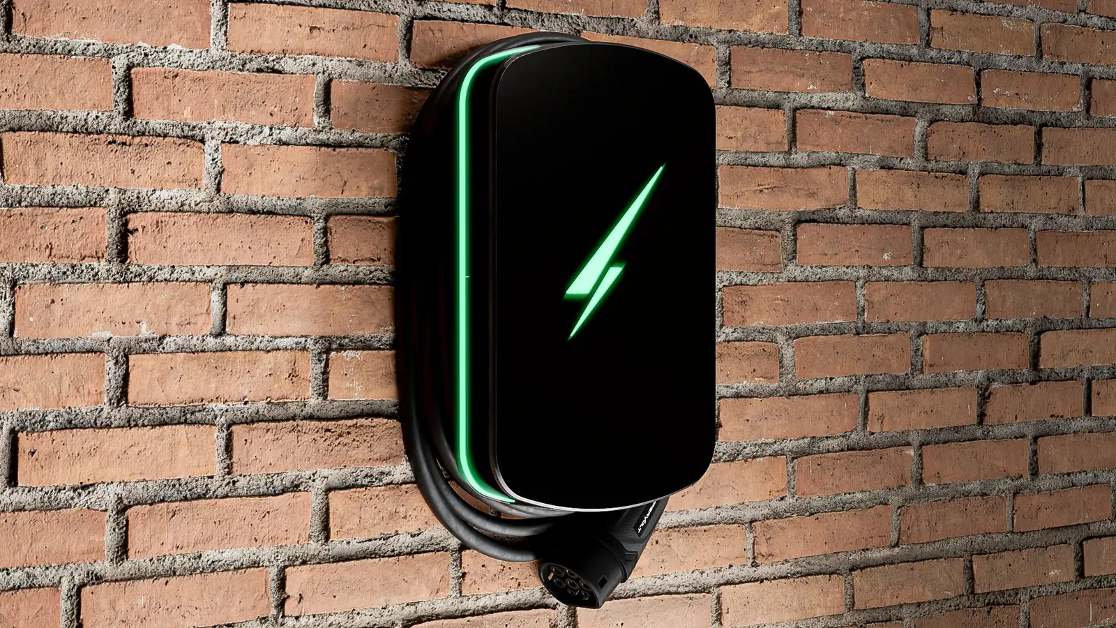 EV charger with green status light on a brick wall, installed by Selec Group