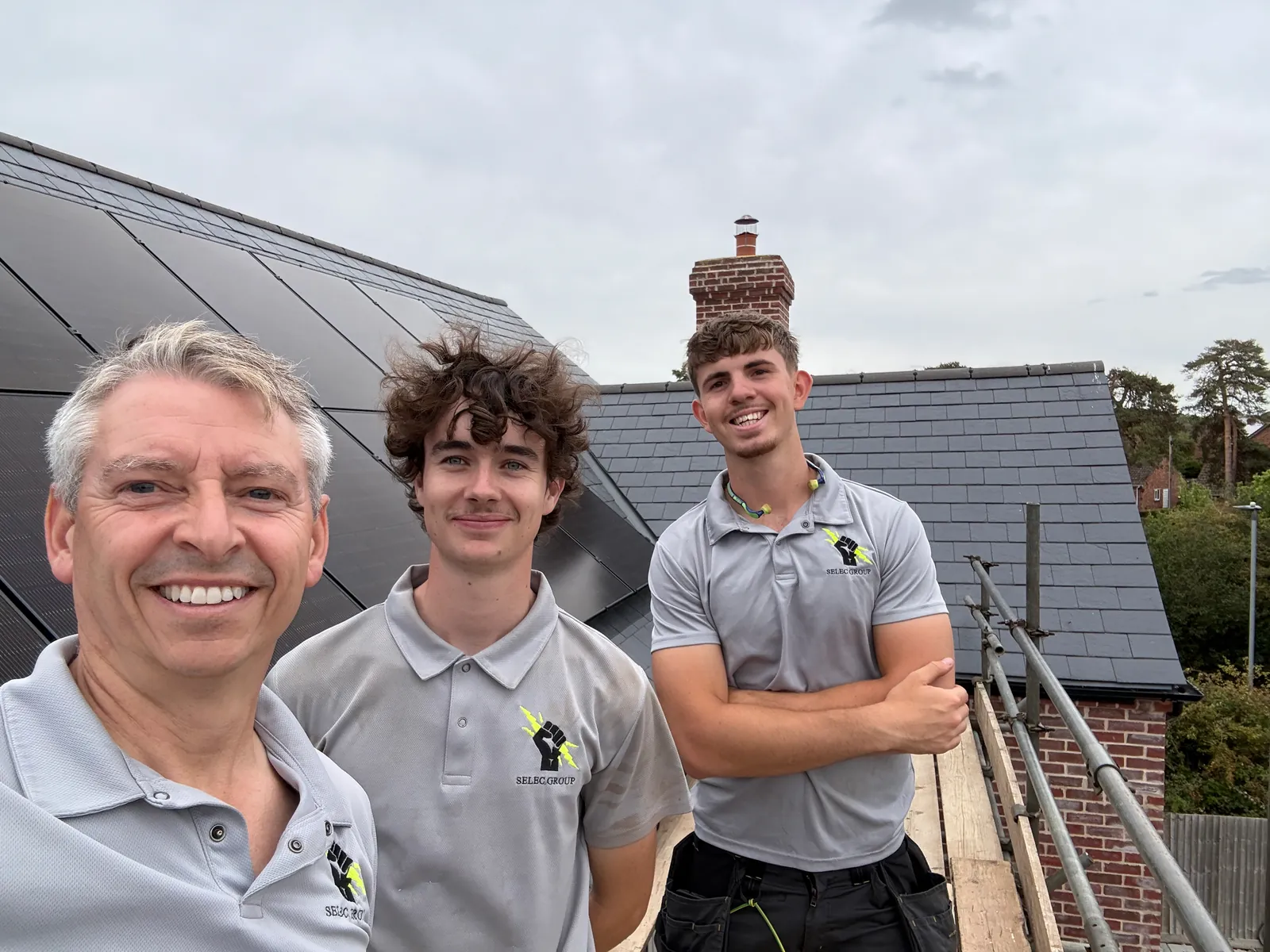 Jason Pope and the Selec Group team on scaffold at a solar install in Kimbolton
