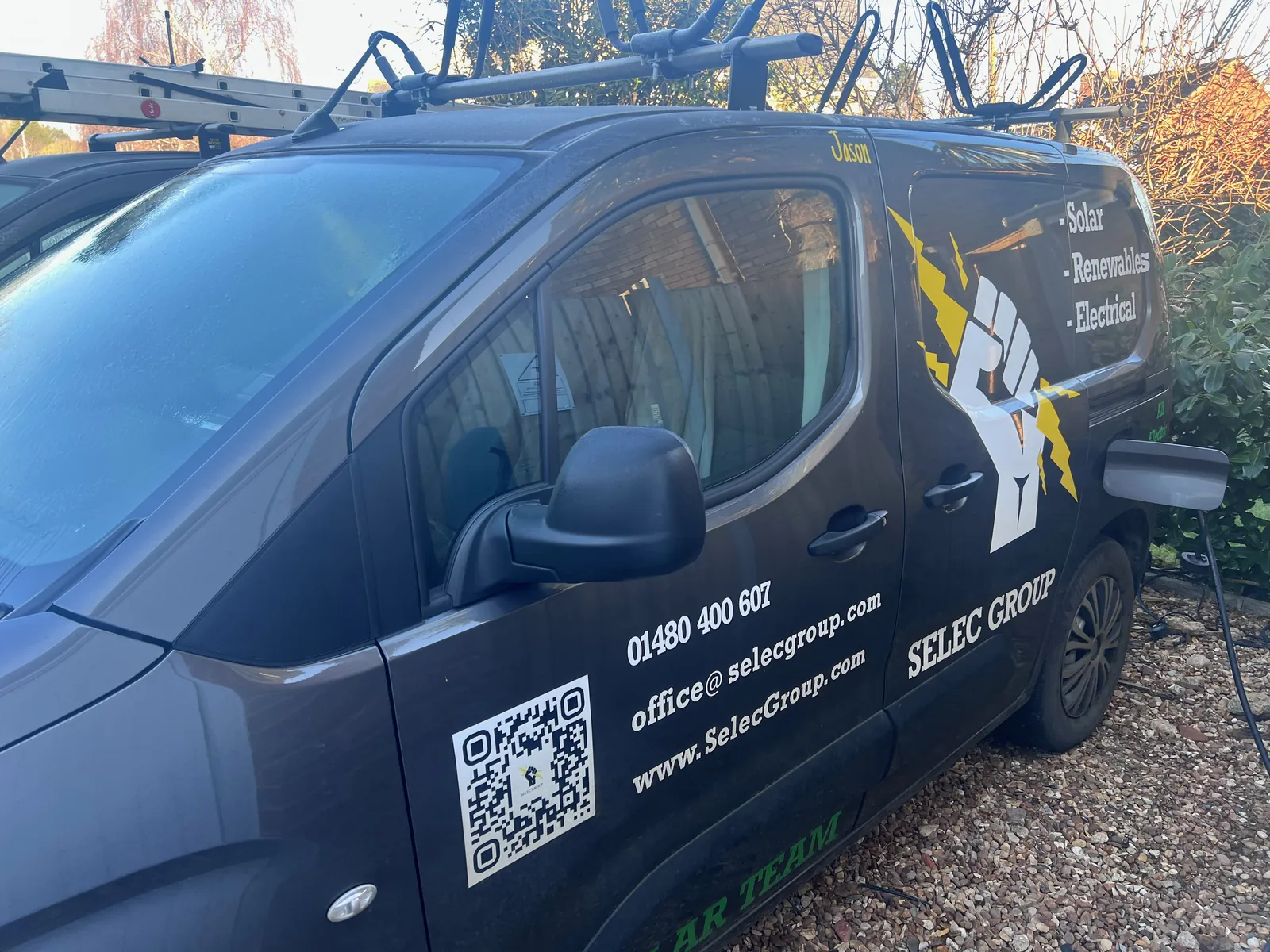 Selec Group van with company livery, parked on a job